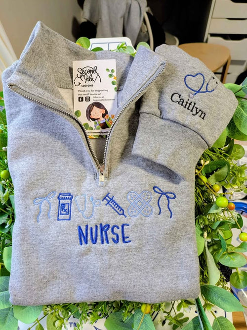 Embroidered Nurse Icon with Sleeve Stethoscope Name Quarter Zip Sweater